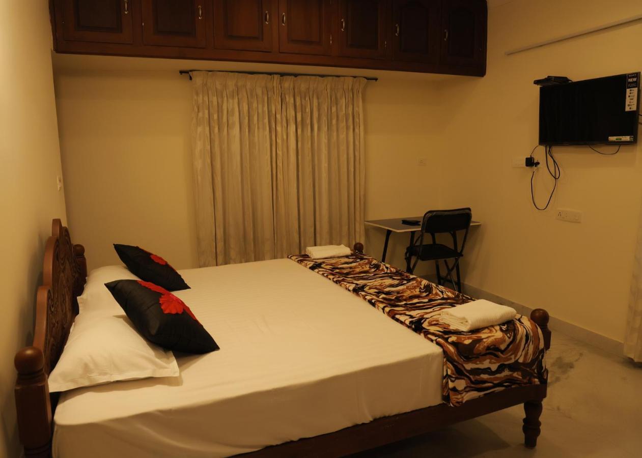 Malpans Mansion Hotel Nedumbassery Buitenkant foto